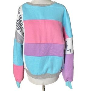 NWT Fashion Nova It’s All About Love Sweatshirt. Size Medium